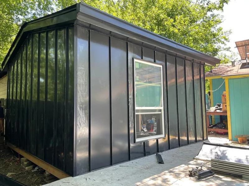 Black standing seam metal wall panels for Metal Roof Installation in Beaumont